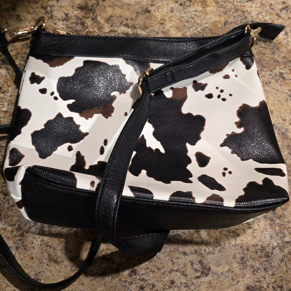 Malibu Sky Cow Print Bag with adjustable strap faux leather
